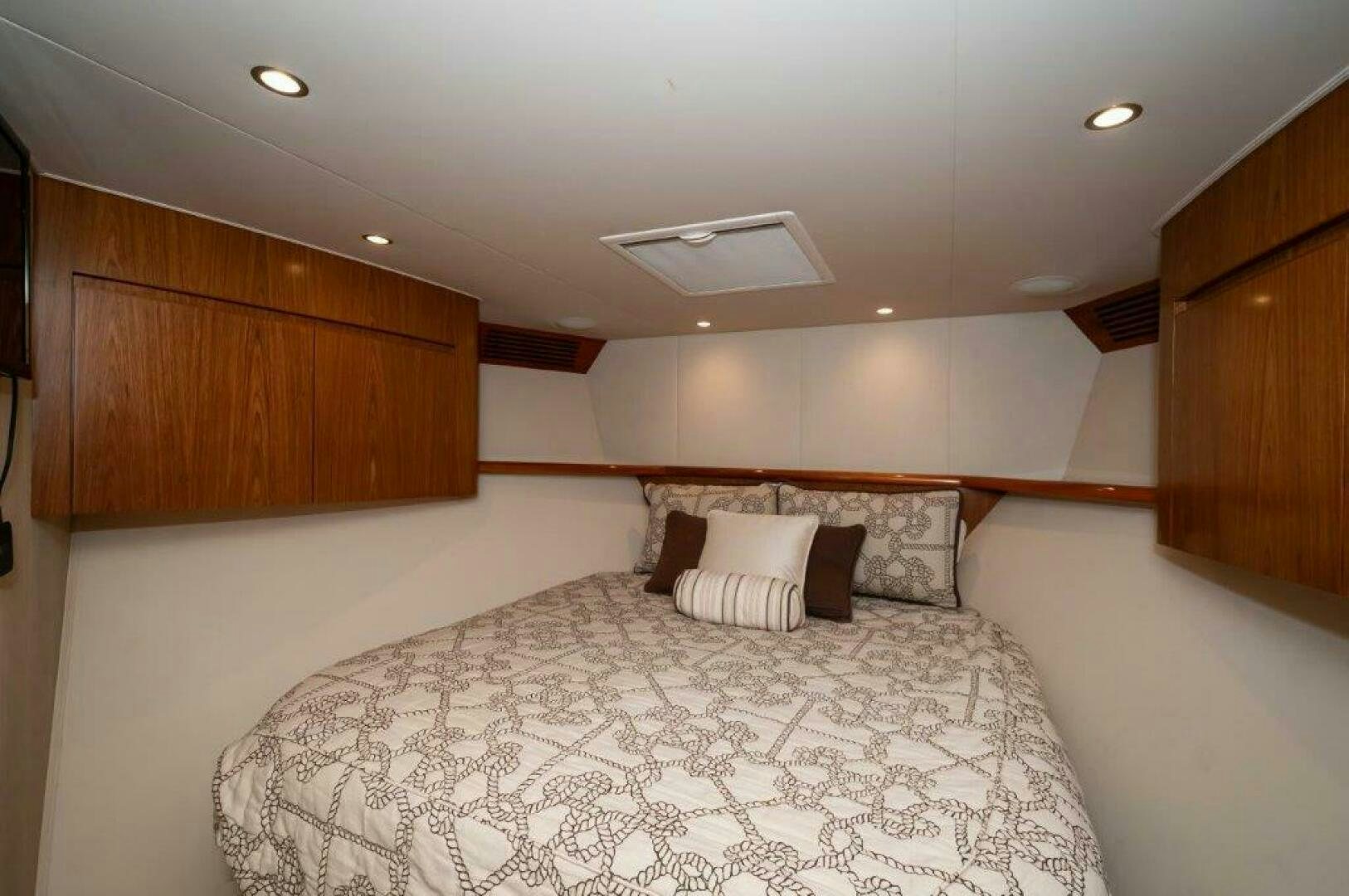 a bed in a room aboard BAREFOOT DRIVE Yacht for Sale