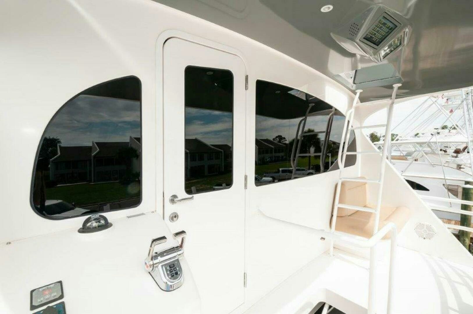 a white vehicle with a window aboard BAREFOOT DRIVE Yacht for Sale