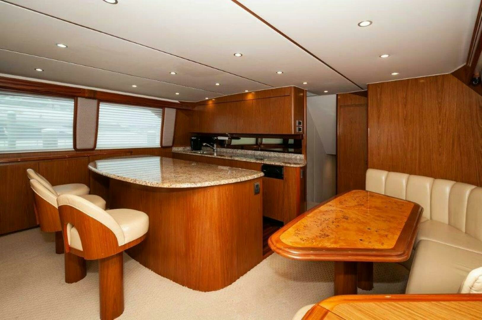 a kitchen and living room aboard BAREFOOT DRIVE Yacht for Sale