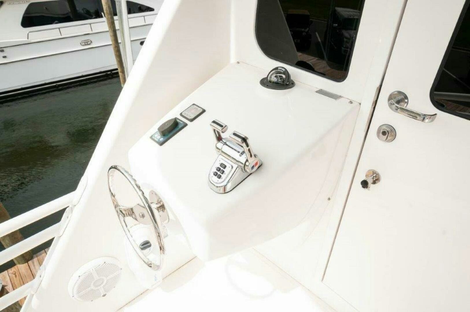 the front of a white car aboard BAREFOOT DRIVE Yacht for Sale