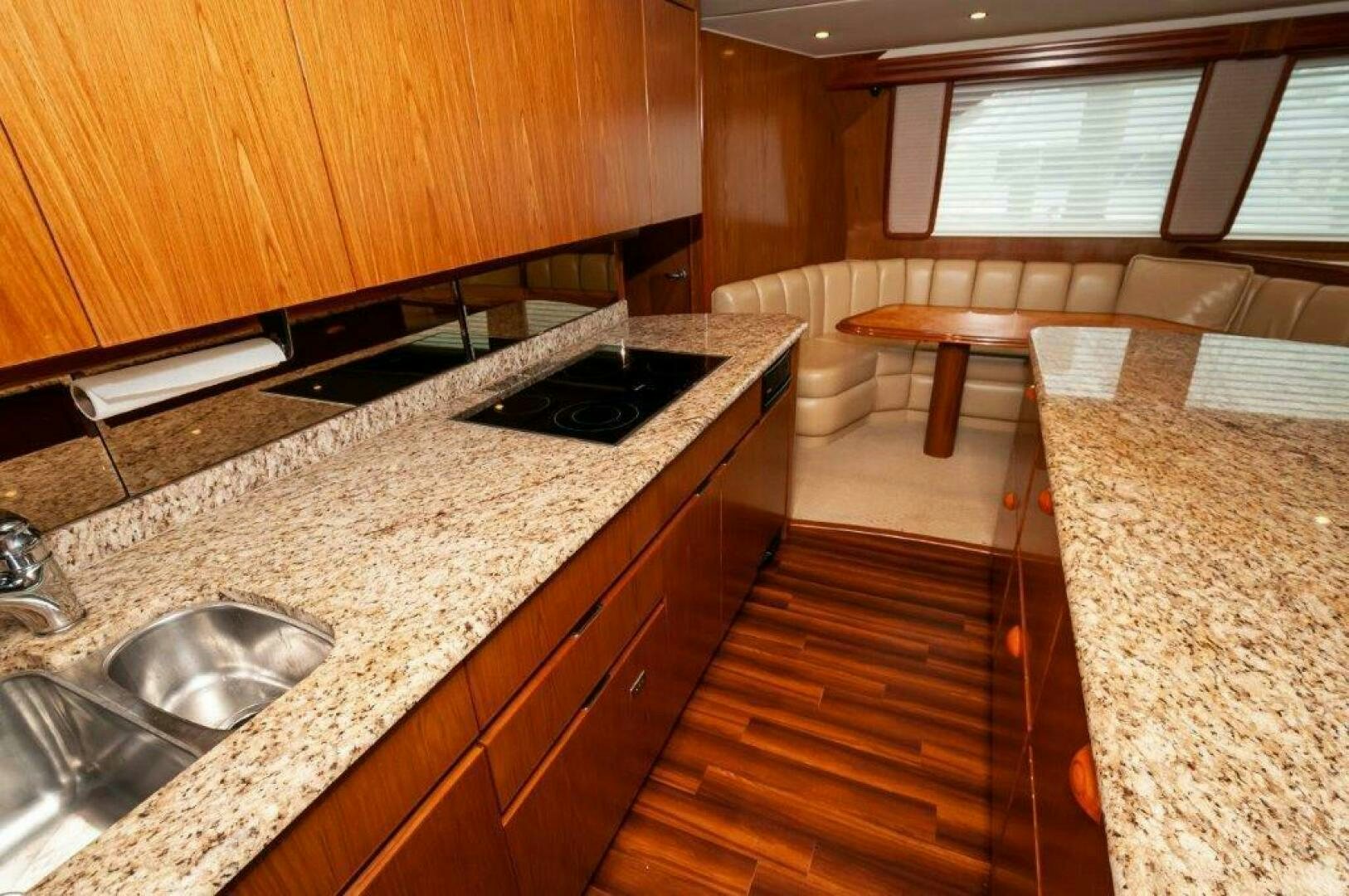 a kitchen with a marble counter top aboard BAREFOOT DRIVE Yacht for Sale