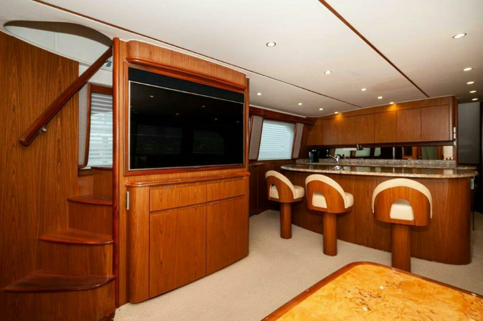 a kitchen with a large tv aboard BAREFOOT DRIVE Yacht for Sale
