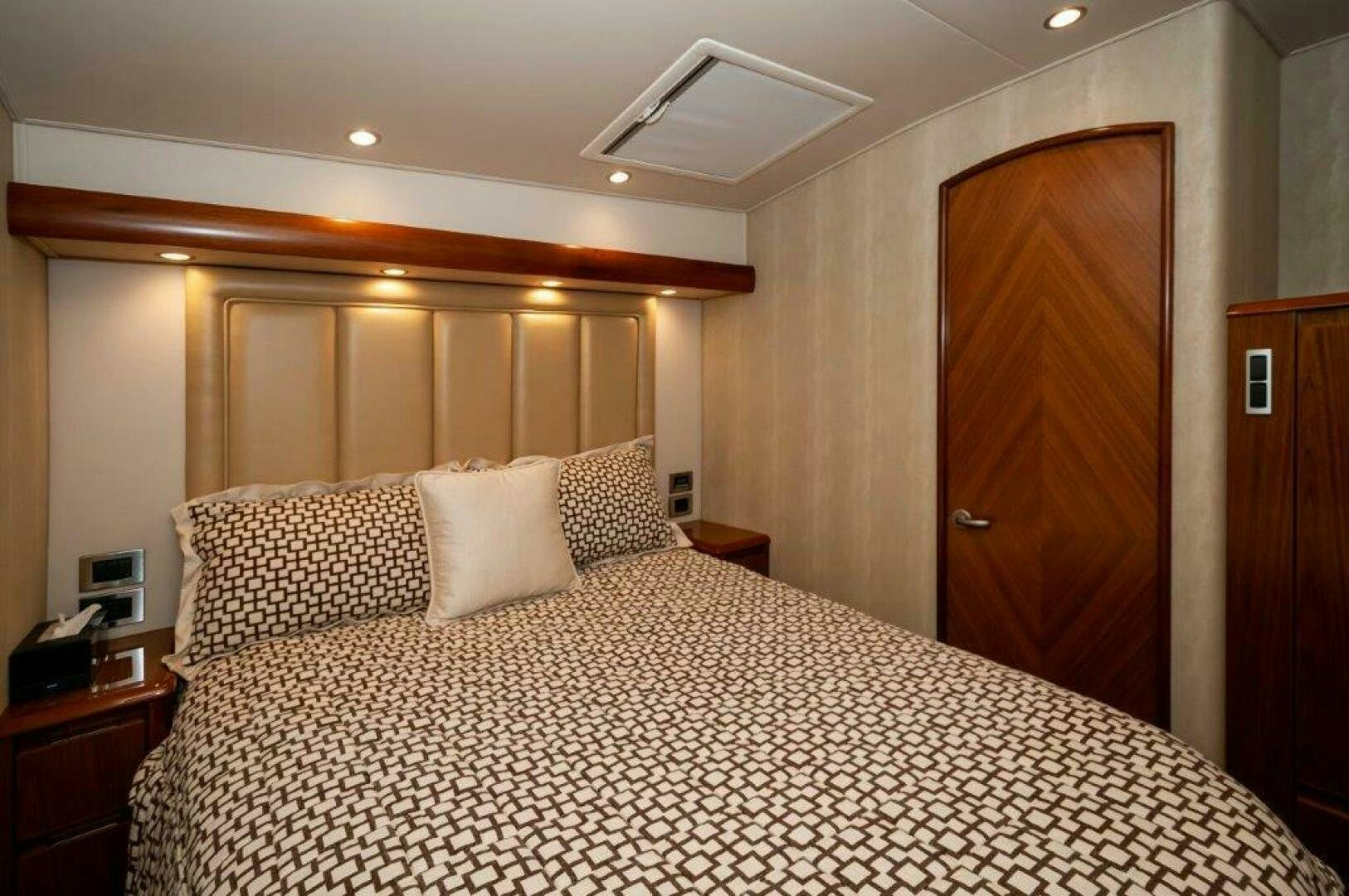 a bed with pillows aboard BAREFOOT DRIVE Yacht for Sale