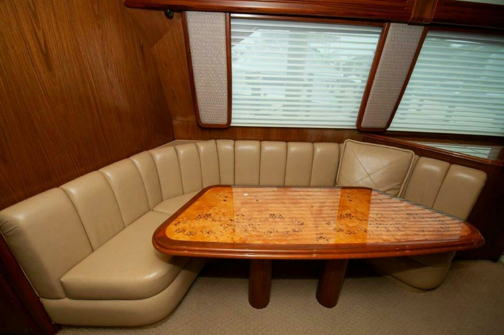 a couch with a coffee table aboard BAREFOOT DRIVE Yacht for Sale