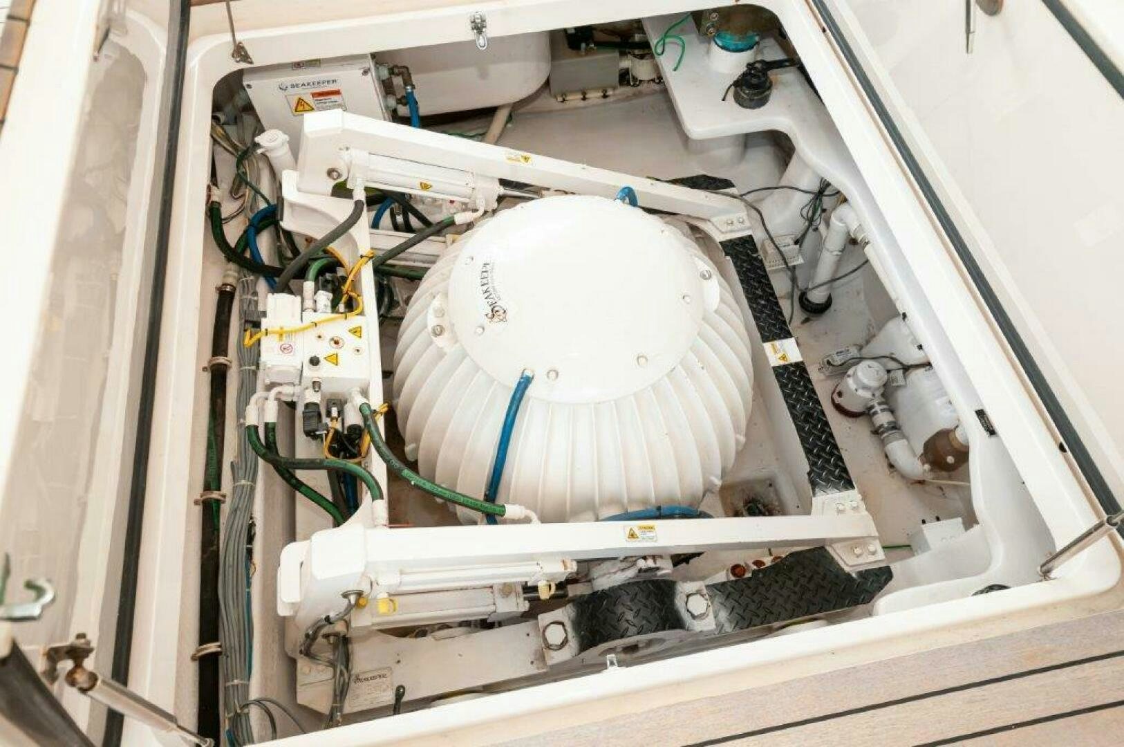 a white hard hat on a white machine aboard BAREFOOT DRIVE Yacht for Sale