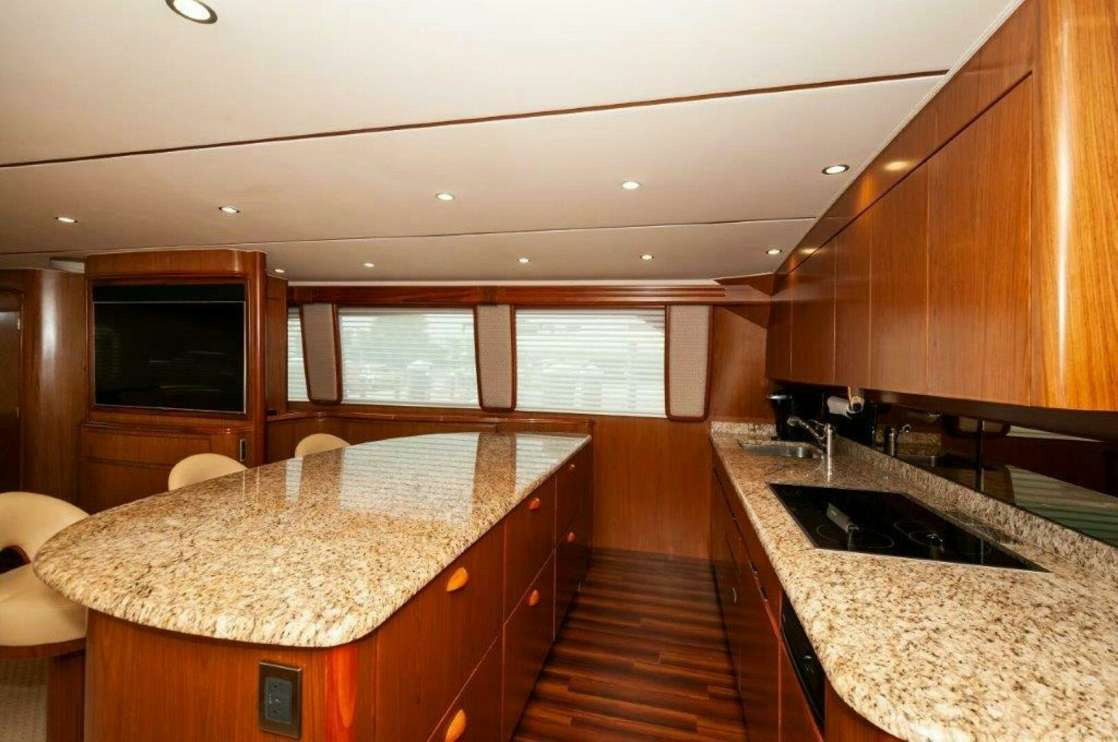 a kitchen with a large island aboard BAREFOOT DRIVE Yacht for Sale