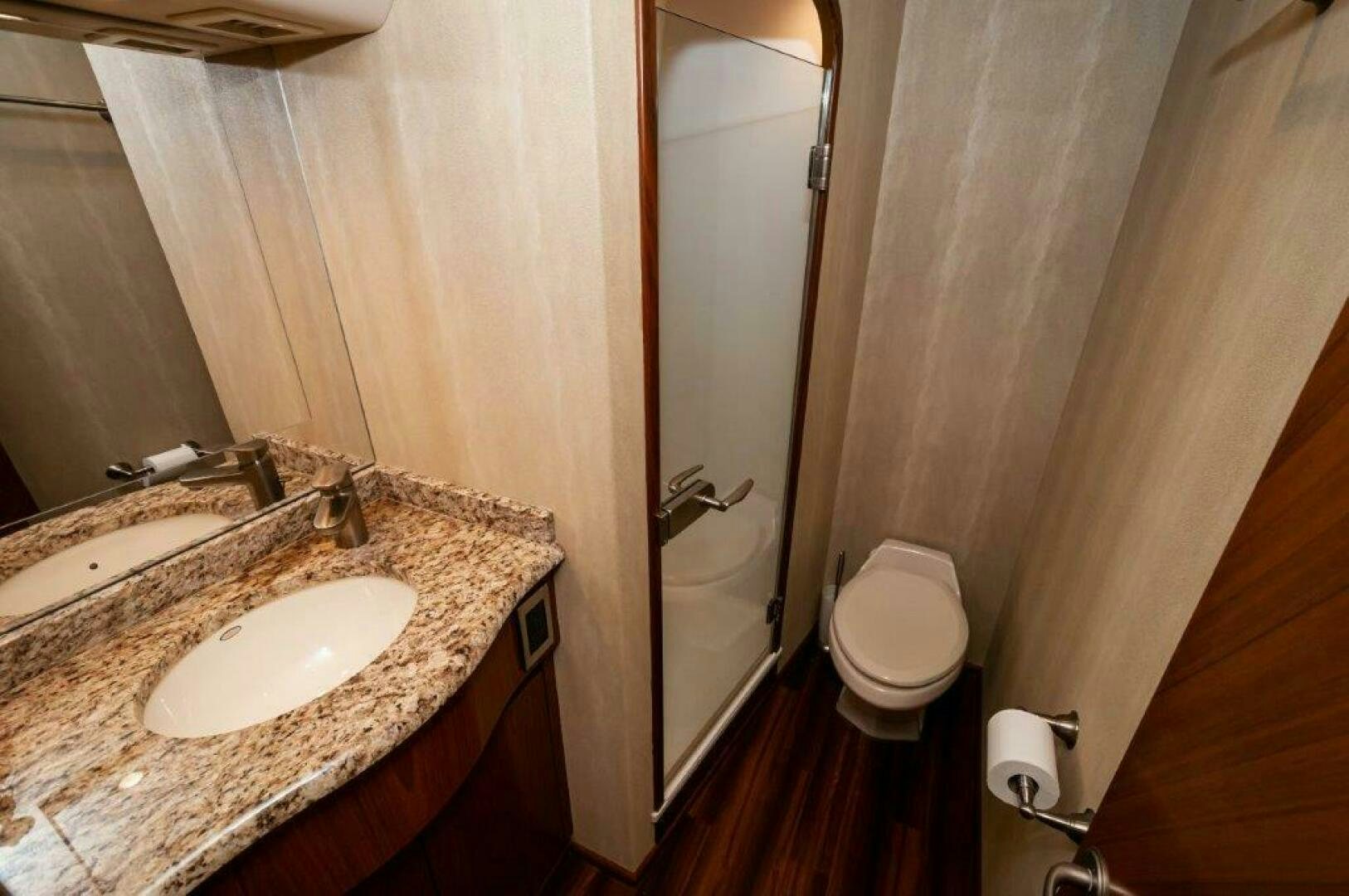 a bathroom with a sink and a shower aboard BAREFOOT DRIVE Yacht for Sale