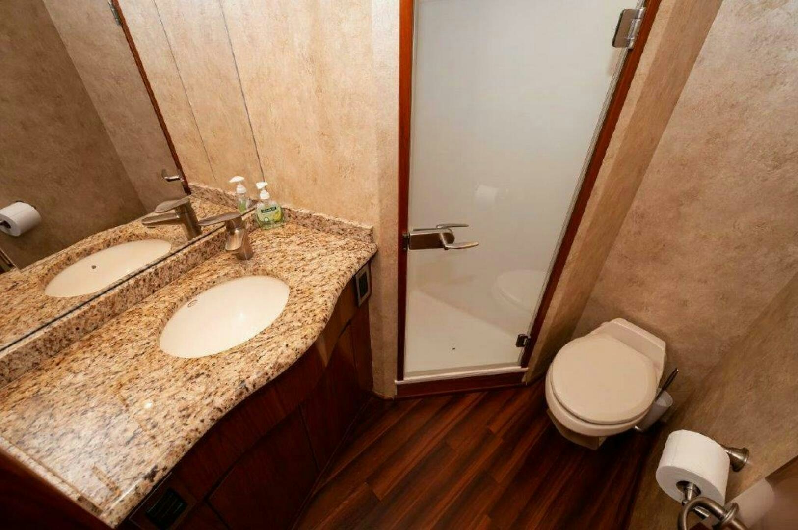 a bathroom with a sink and a toilet aboard BAREFOOT DRIVE Yacht for Sale