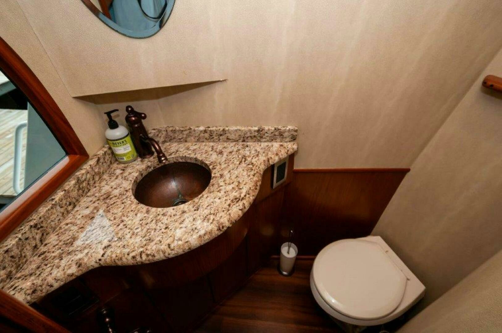 a sink and toilet in a bathroom aboard BAREFOOT DRIVE Yacht for Sale