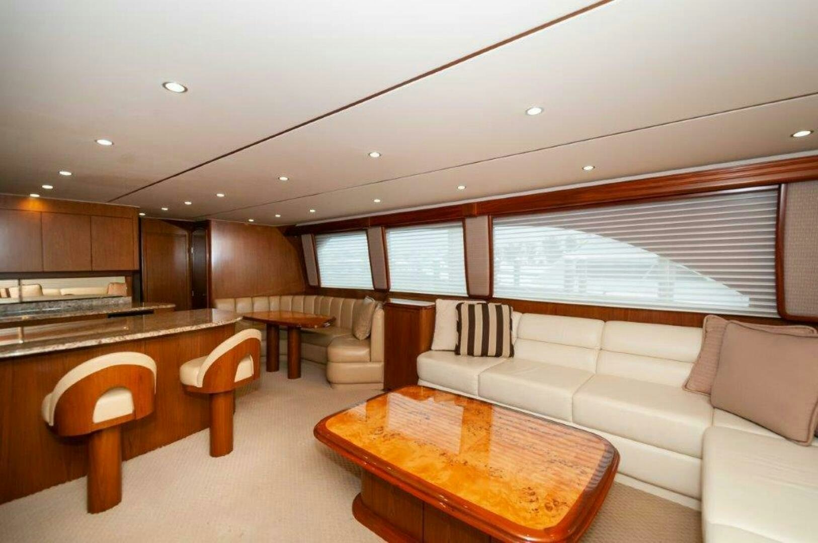 a living room with a large window aboard BAREFOOT DRIVE Yacht for Sale