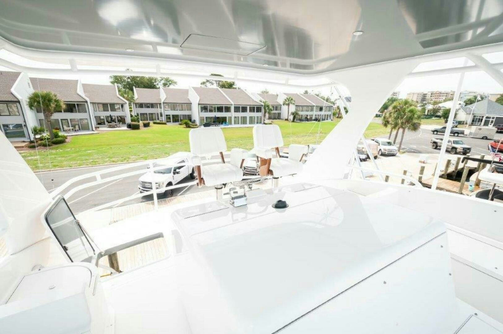 a large white building with a pool aboard BAREFOOT DRIVE Yacht for Sale