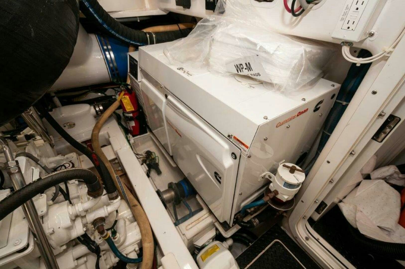 a person working on a machine aboard BAREFOOT DRIVE Yacht for Sale