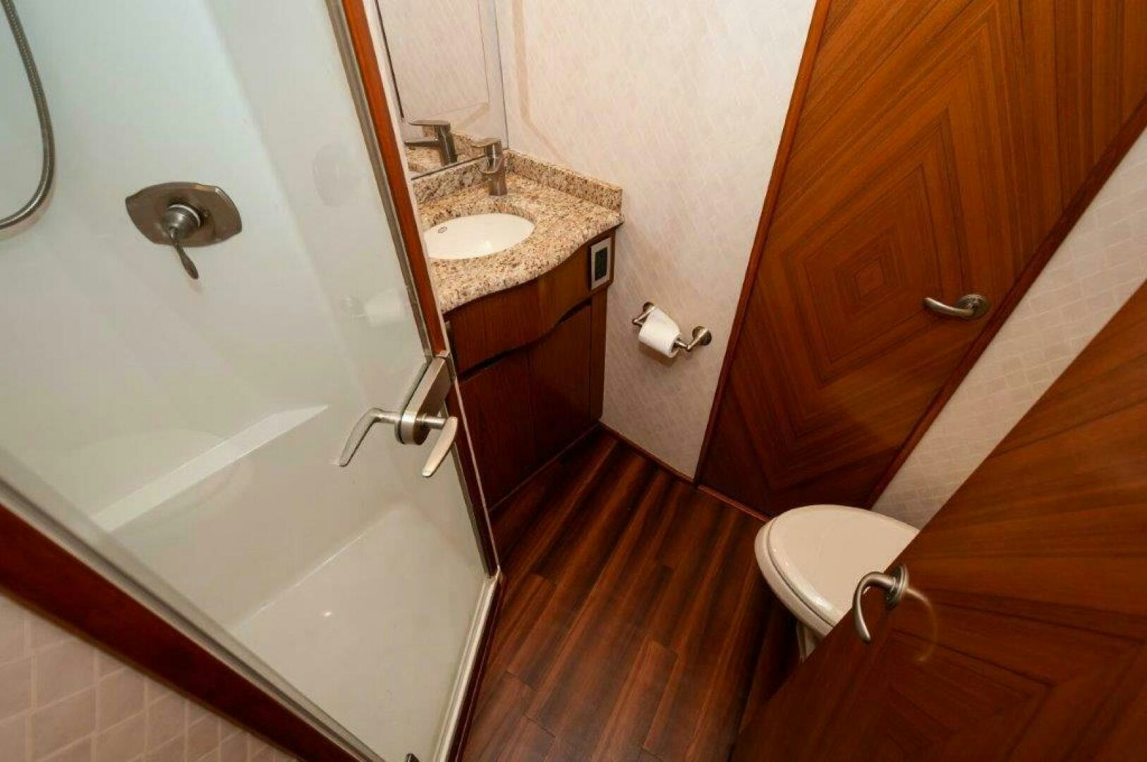 a bathroom with a sink and a toilet aboard BAREFOOT DRIVE Yacht for Sale