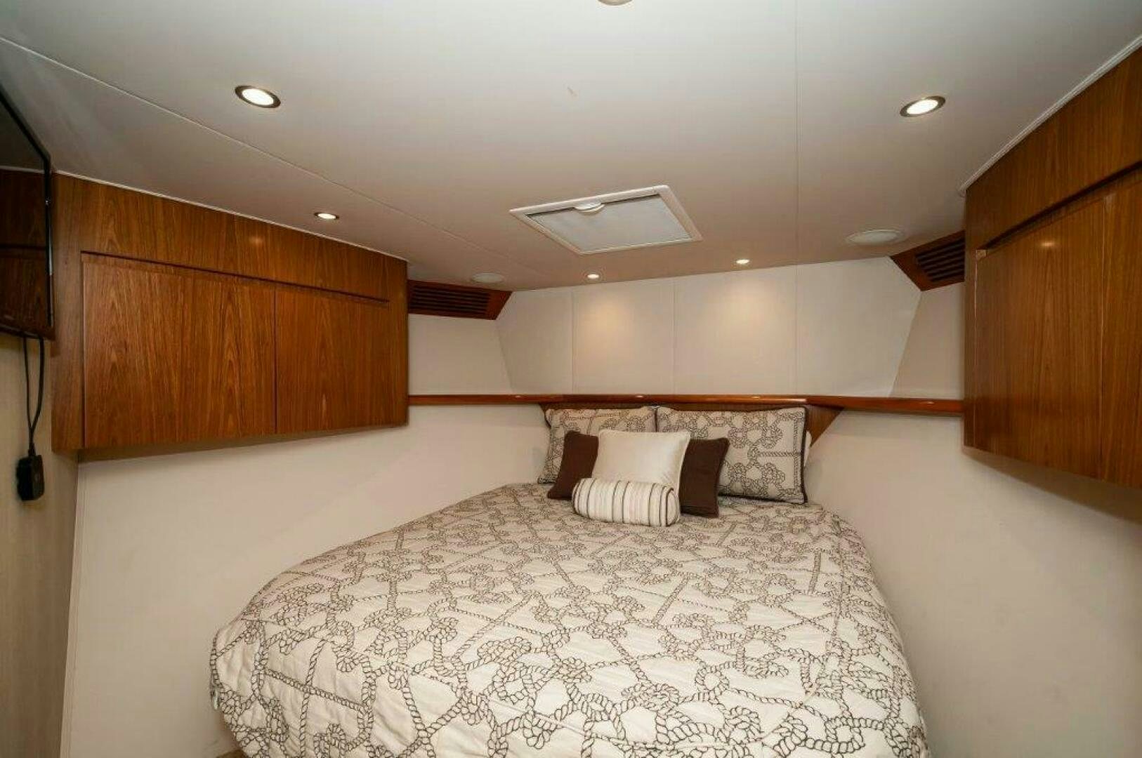 a bed in a room aboard BAREFOOT DRIVE Yacht for Sale