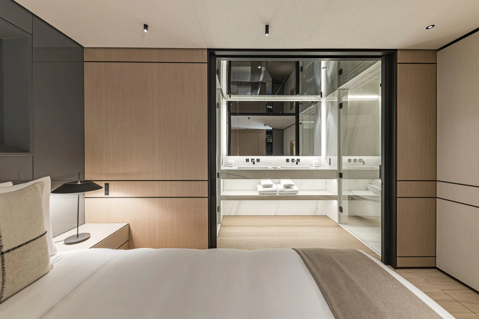 a room with a bed and a closet aboard CONRAD C144S HULL 4 Yacht for Sale