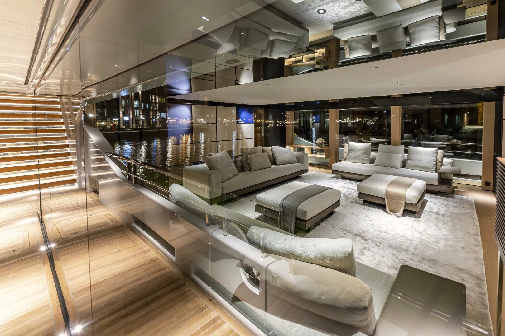 a large room with a couch and a table aboard CONRAD C144S HULL 4 Yacht for Sale