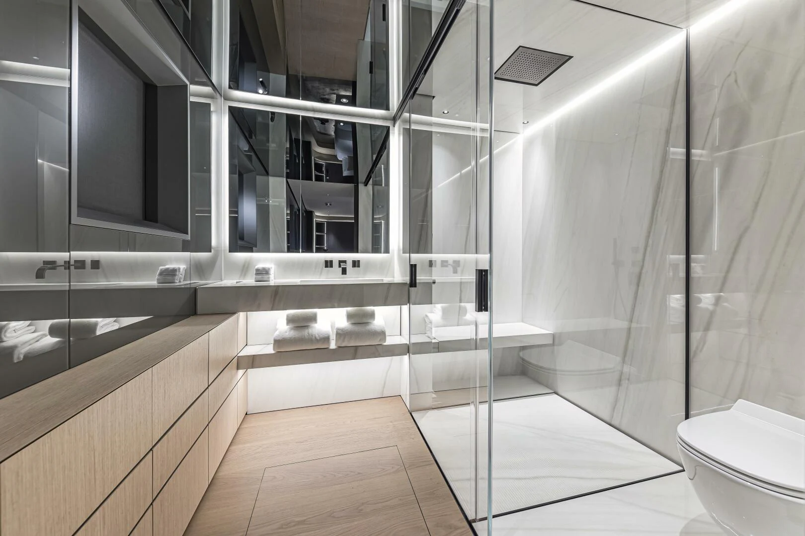 a bathroom with a glass shower aboard CONRAD C144S HULL 4 Yacht for Sale