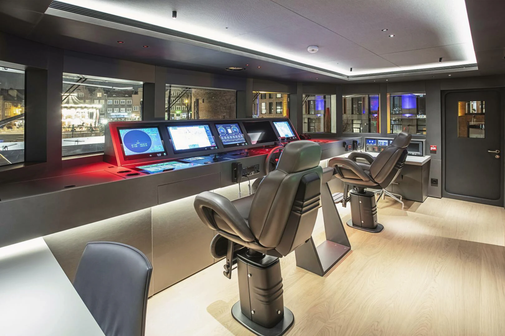 a room with a chair and desks and computers aboard CONRAD C144S HULL 4 Yacht for Sale