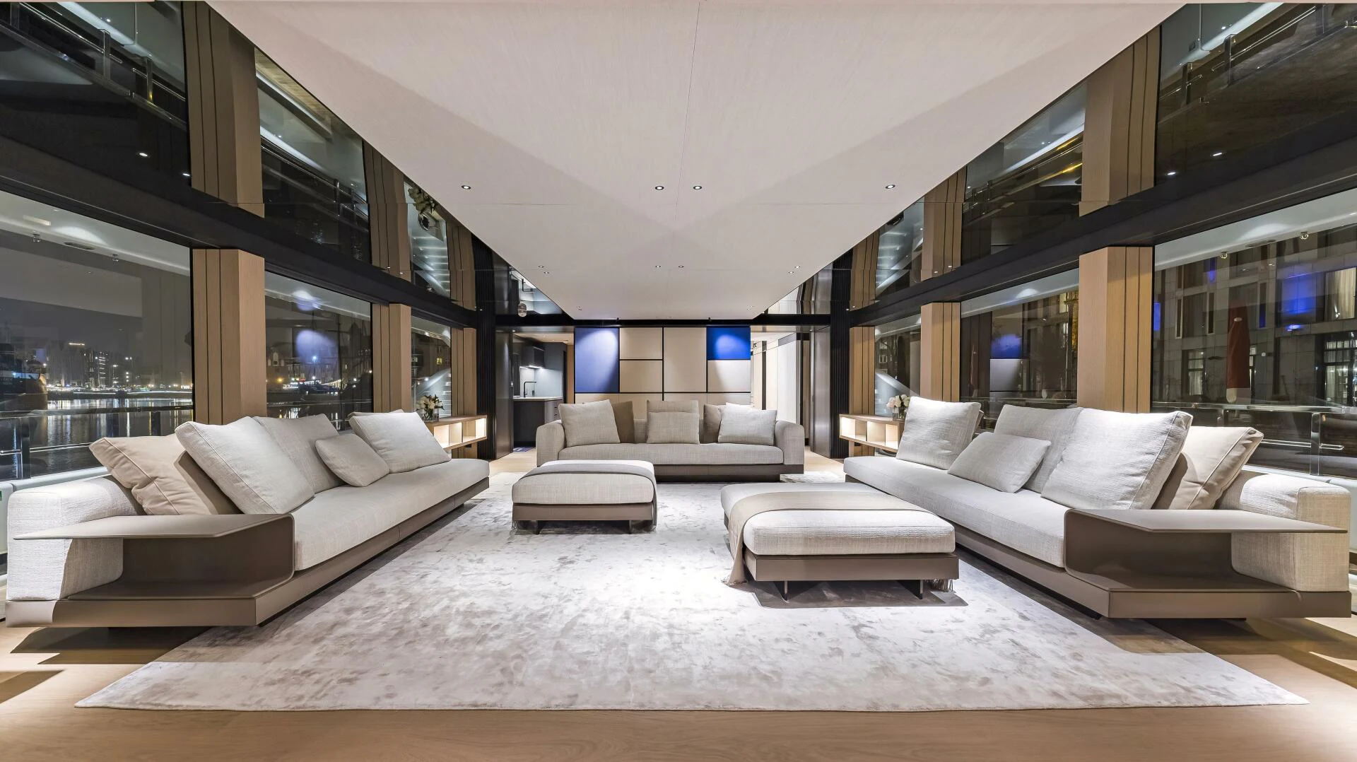 a large room with a couch and a large white bed aboard CONRAD C144S HULL 4 Yacht for Sale