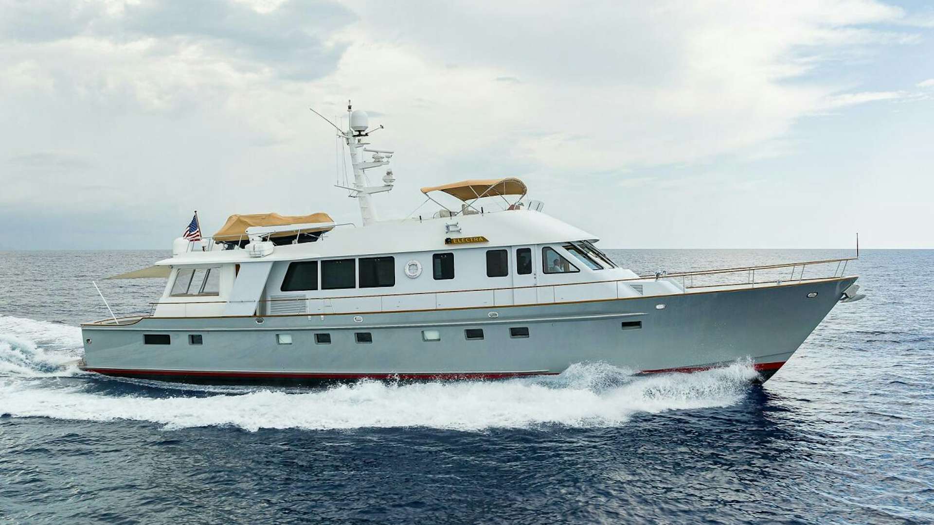 a large white boat aboard ELECTRA Yacht for Sale