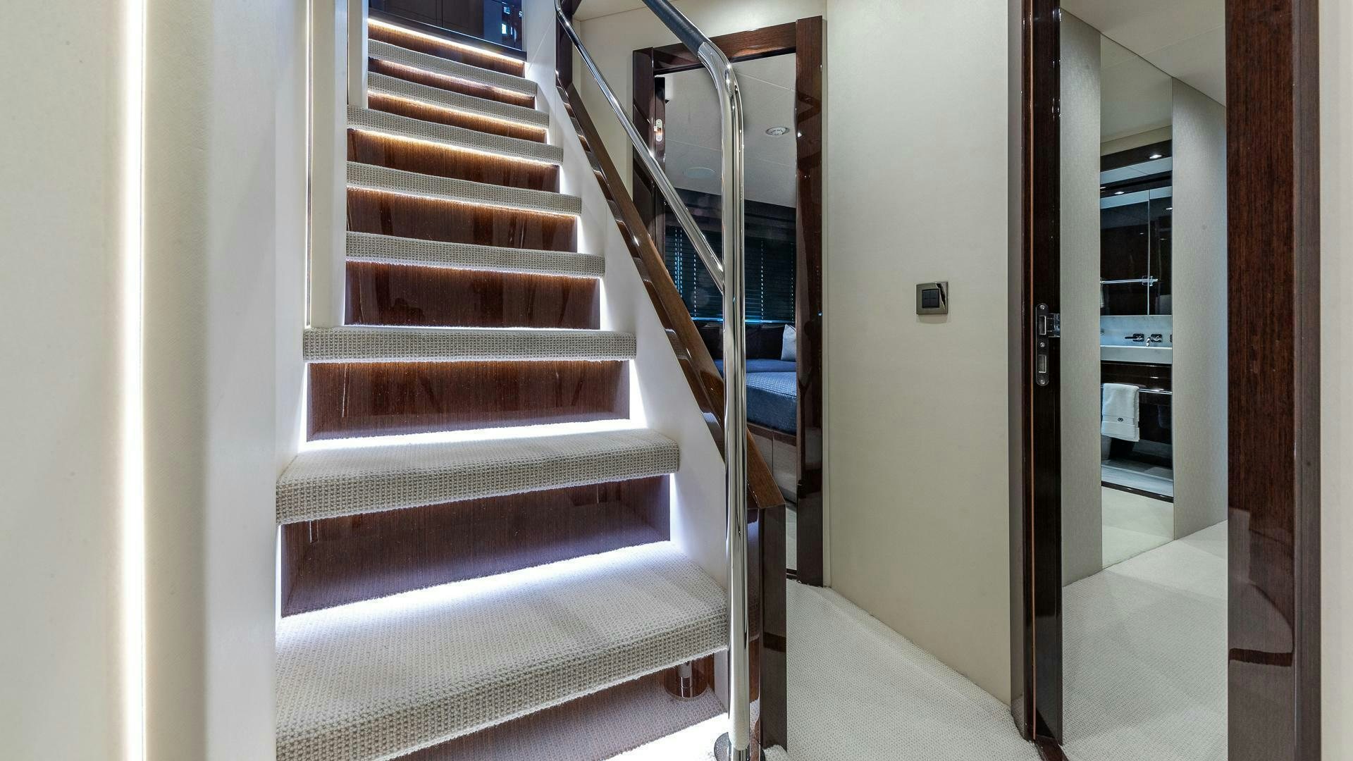 a set of stairs in a house aboard MIRRACLE Yacht for Sale