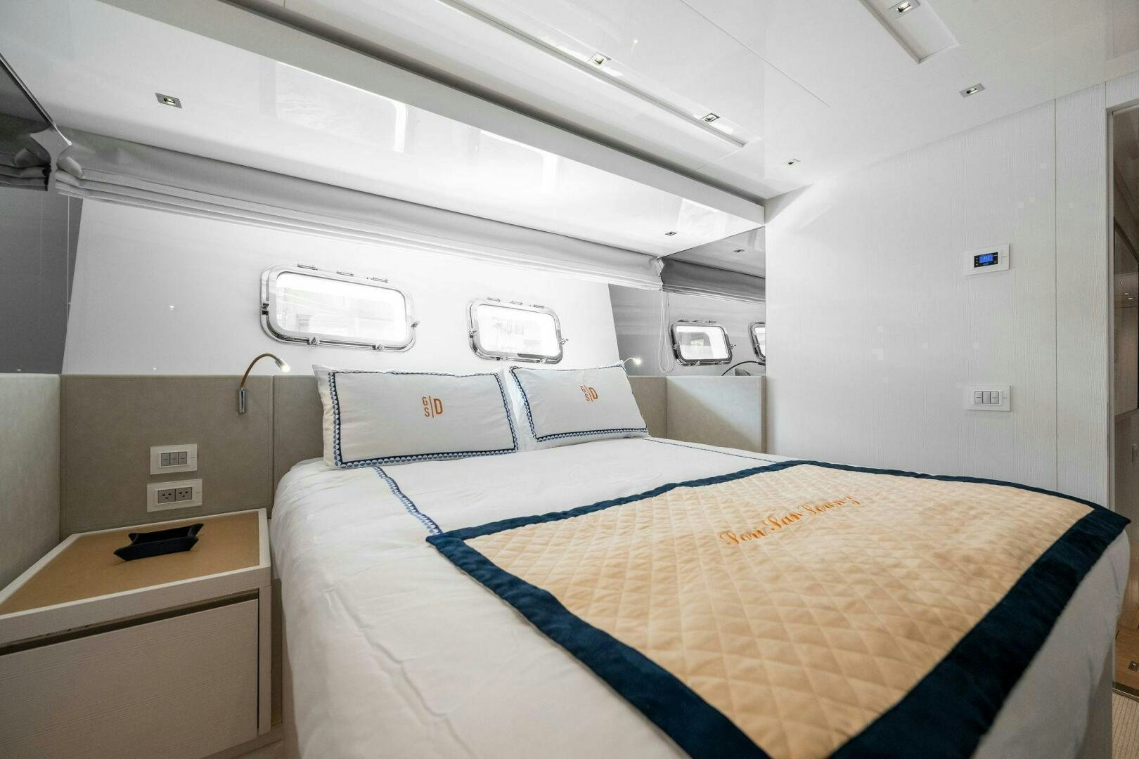 a bed in a room aboard SORI SAN LORENZO Yacht for Sale