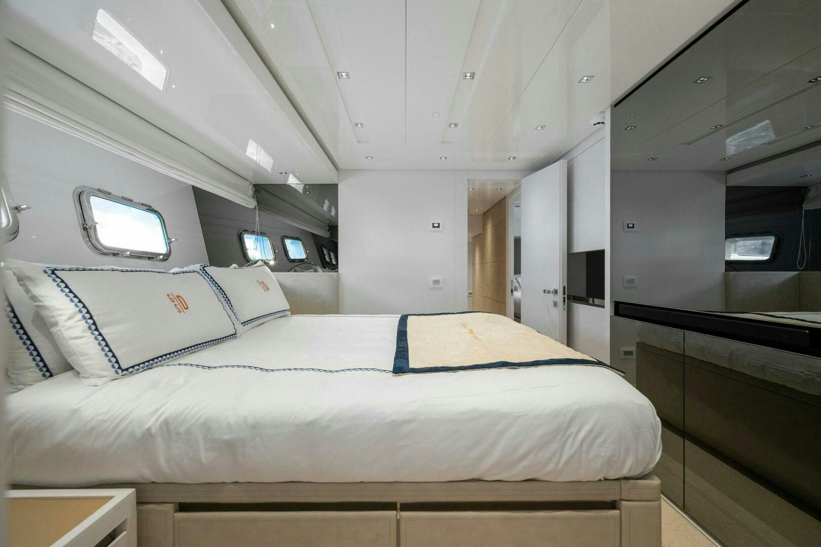 a room with a bed and a window aboard SORI SAN LORENZO Yacht for Sale