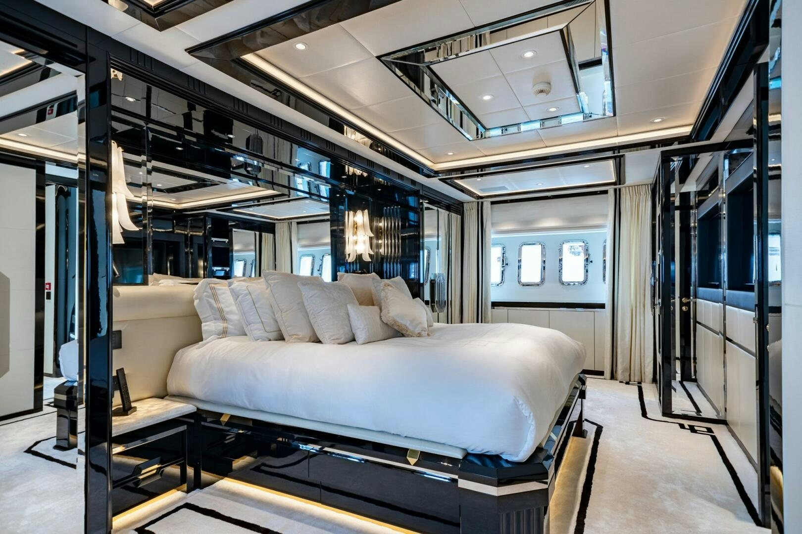 a bed in a room aboard 1K Yacht for Sale