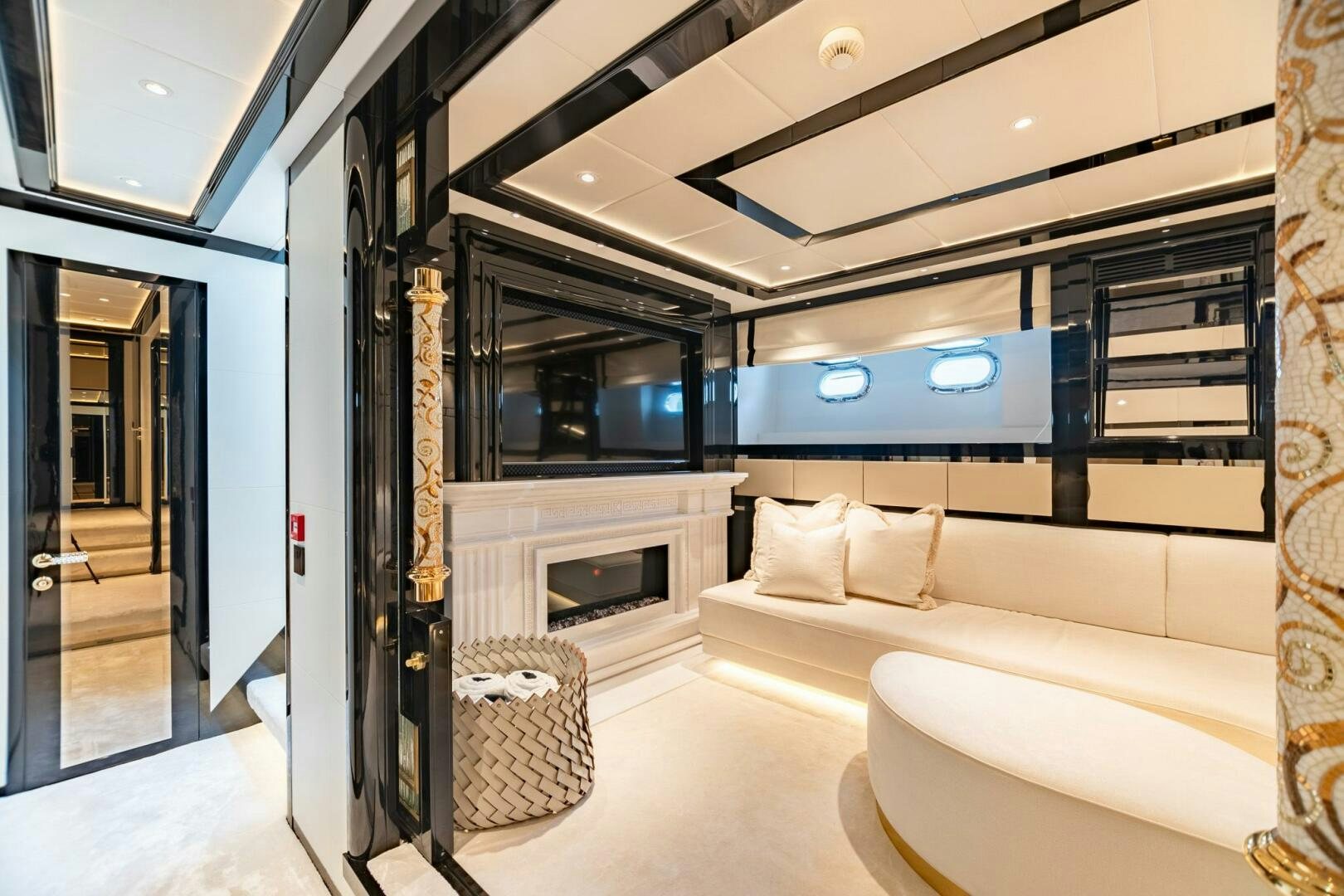a room with a couch and a tv aboard 1K Yacht for Sale