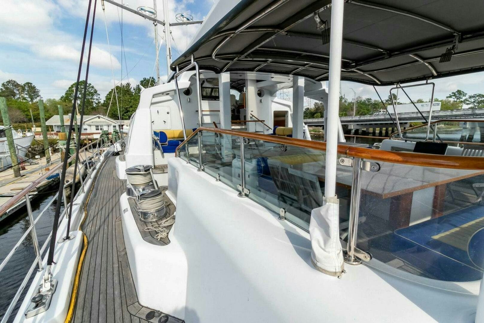 a large white boat on a dock aboard MITSEAAH Yacht for Sale