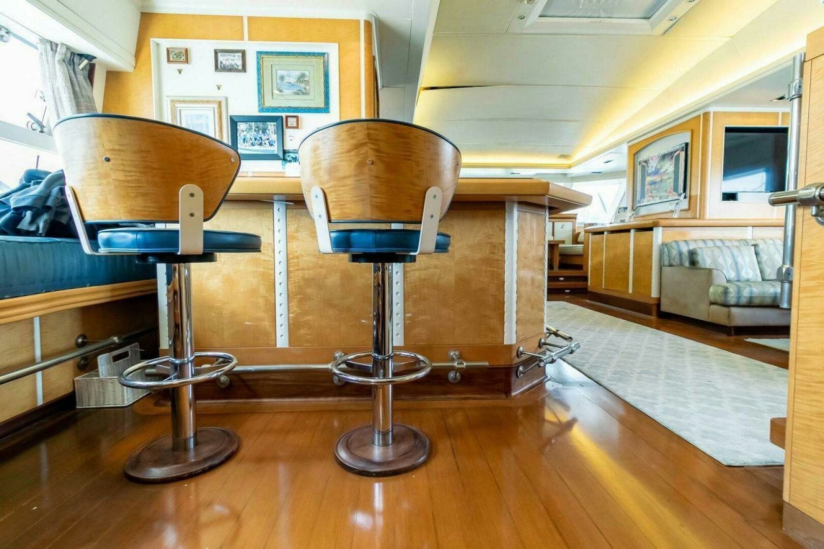 a room with a desk and chairs aboard MITSEAAH Yacht for Sale