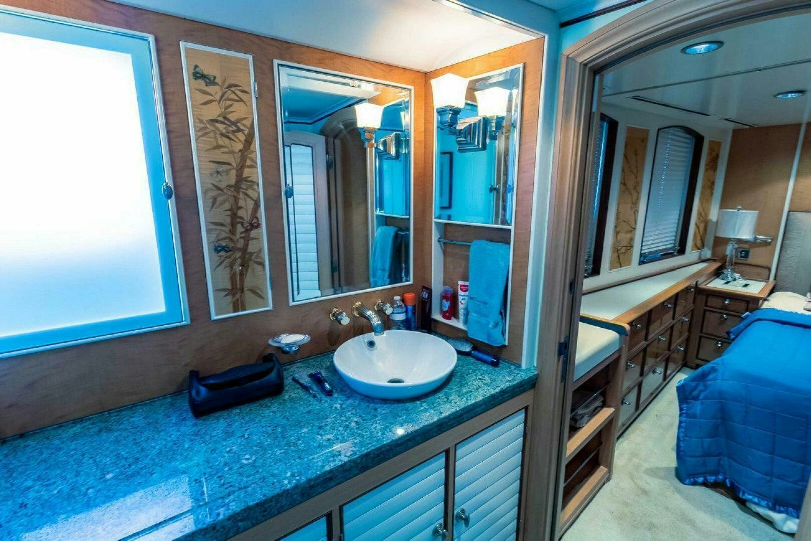a bathroom with a sink and a mirror aboard MITSEAAH Yacht for Sale