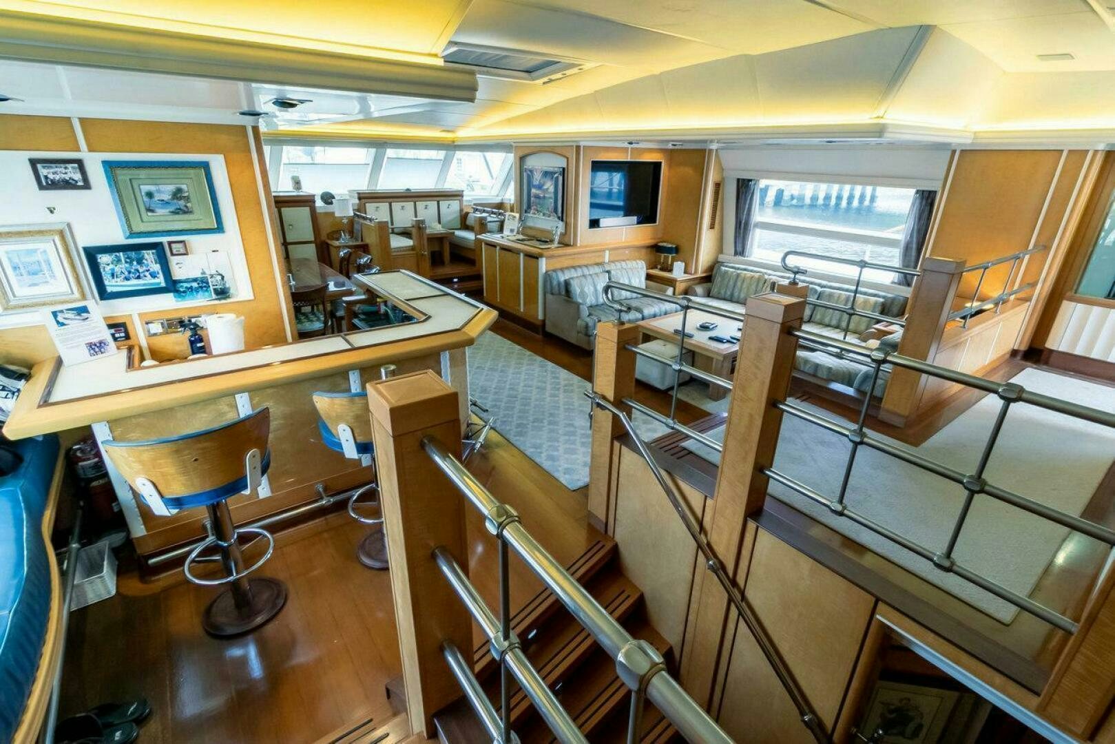 a classroom with desks and chairs aboard MITSEAAH Yacht for Sale