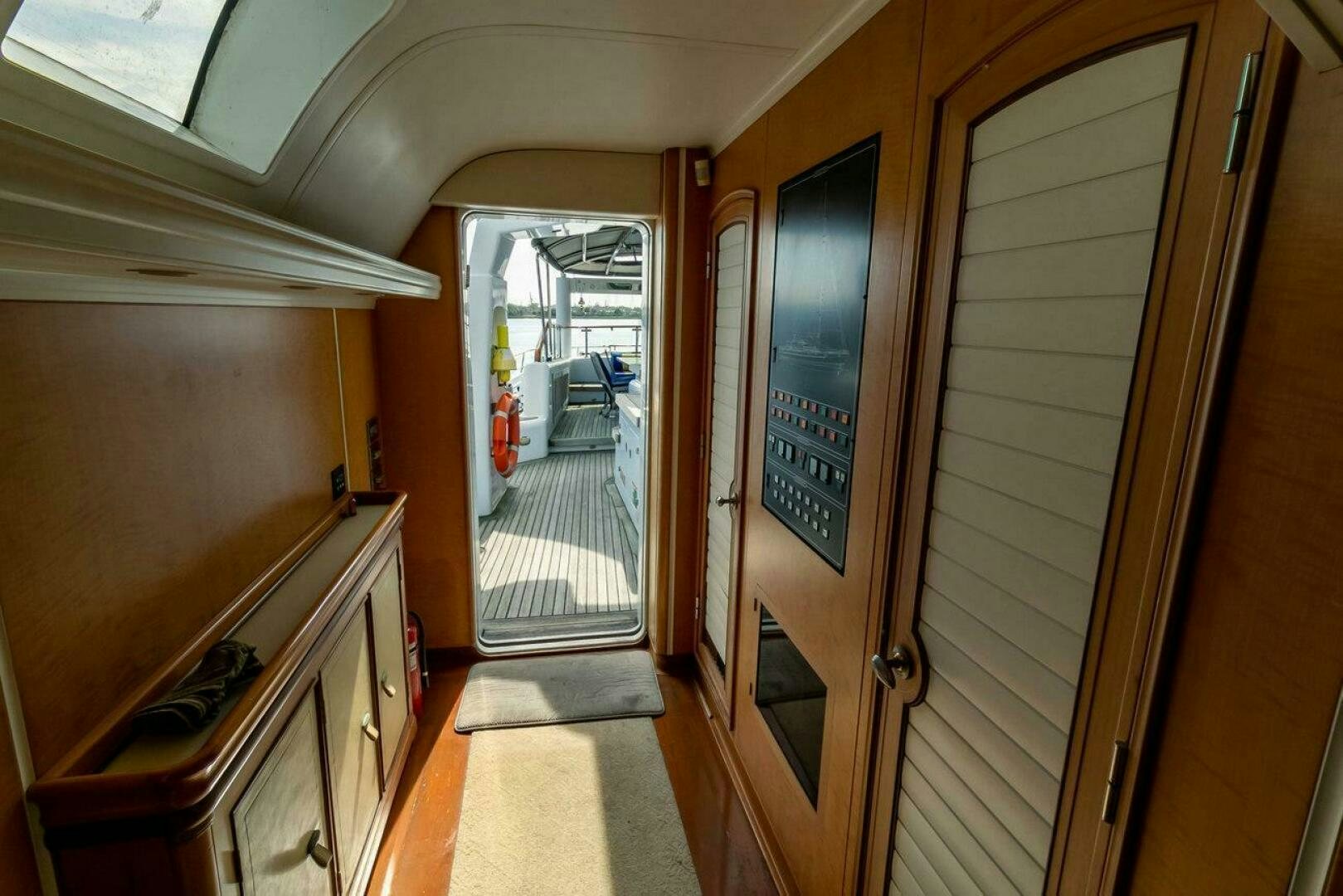 a kitchen with a large glass door aboard MITSEAAH Yacht for Sale