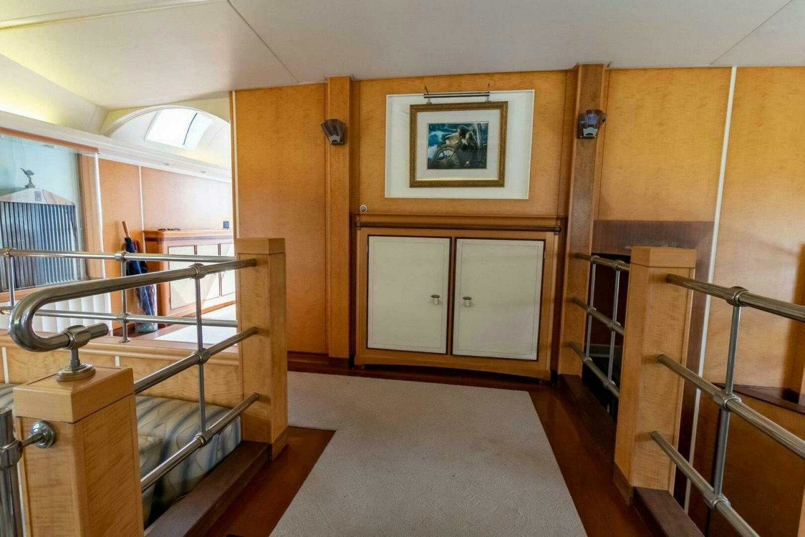 a room with wooden furniture aboard MITSEAAH Yacht for Sale