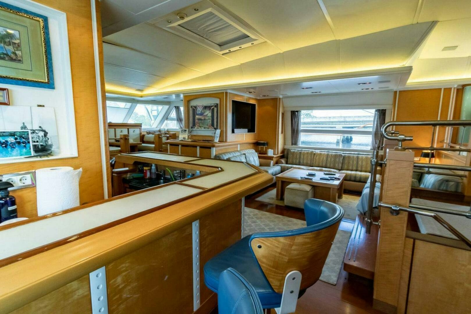 a room with a desk and chairs aboard MITSEAAH Yacht for Sale