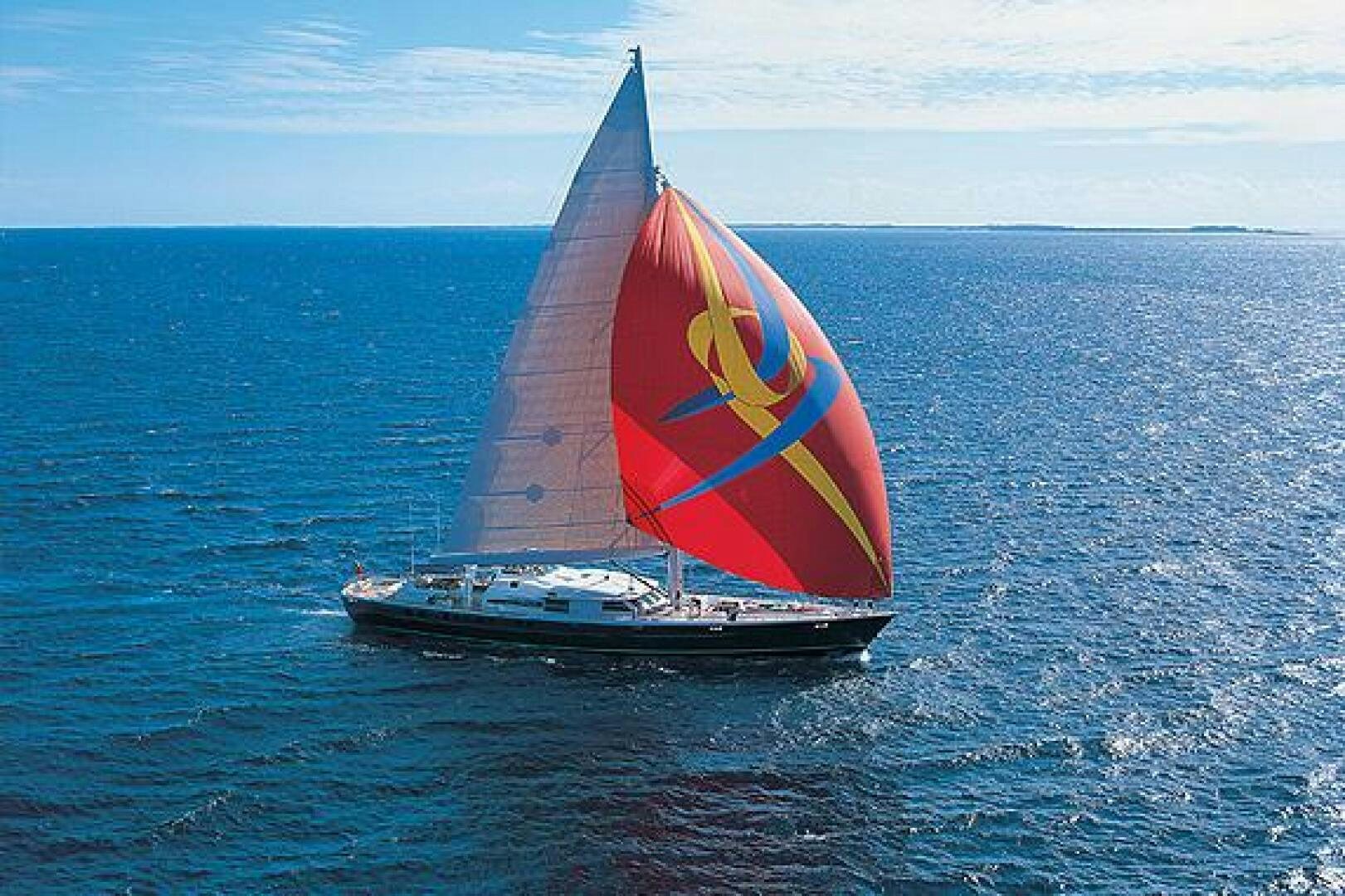 a sailboat in the ocean aboard MITSEAAH Yacht for Sale