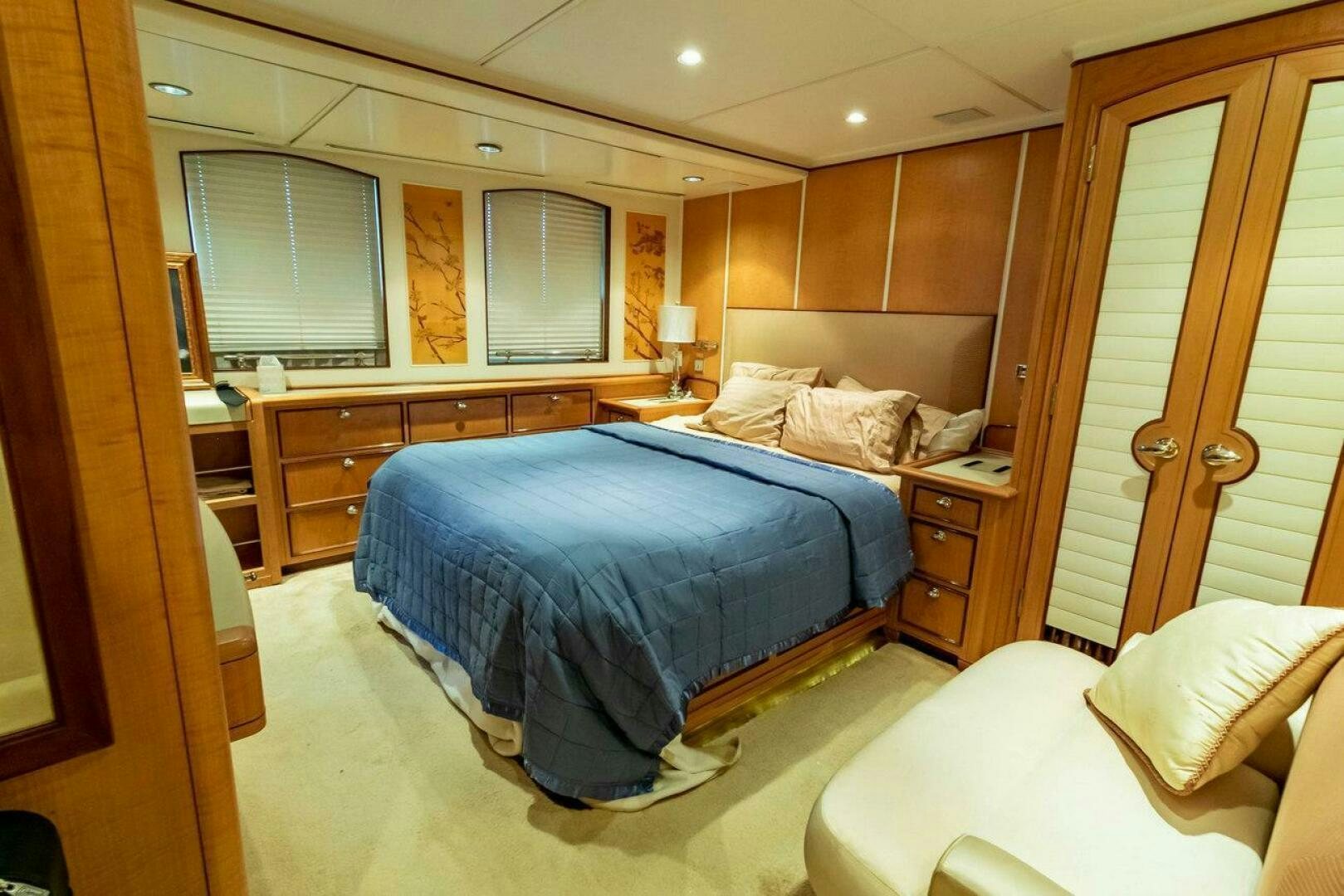 a room with two beds aboard MITSEAAH Yacht for Sale