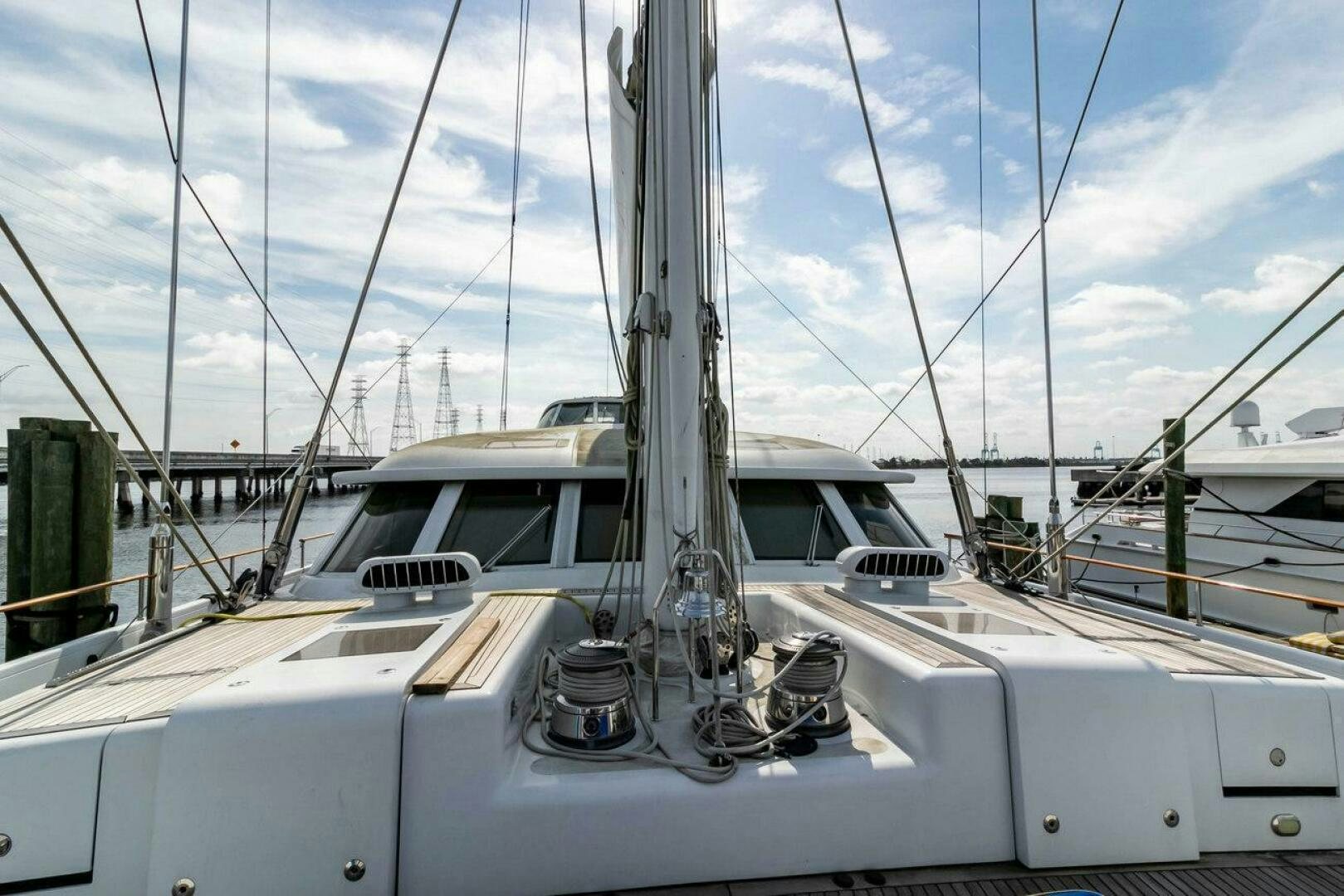 a white boat with a metal frame aboard MITSEAAH Yacht for Sale