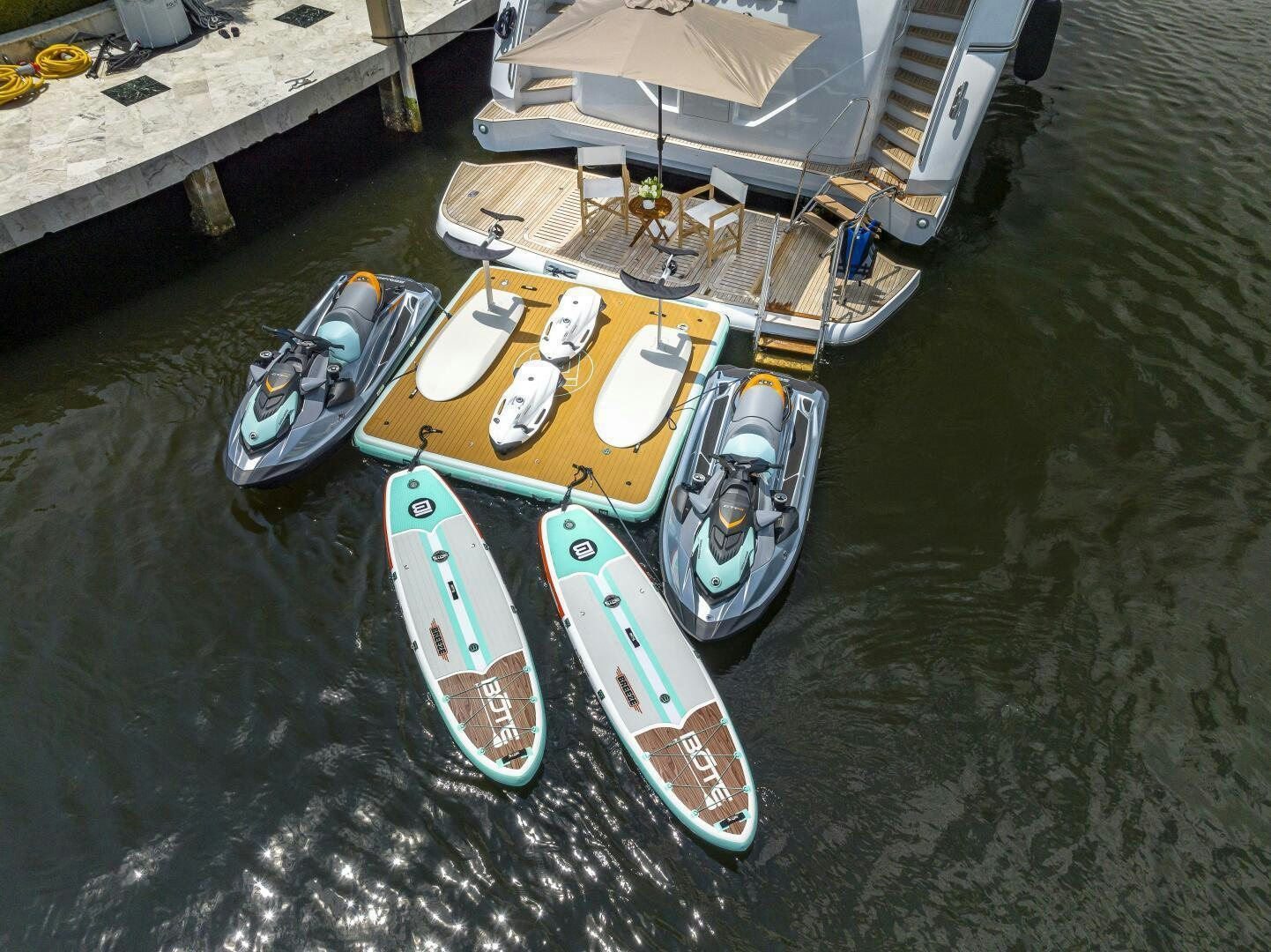 a group of boats on a body of water aboard BEACHFRONT II Yacht for Sale
