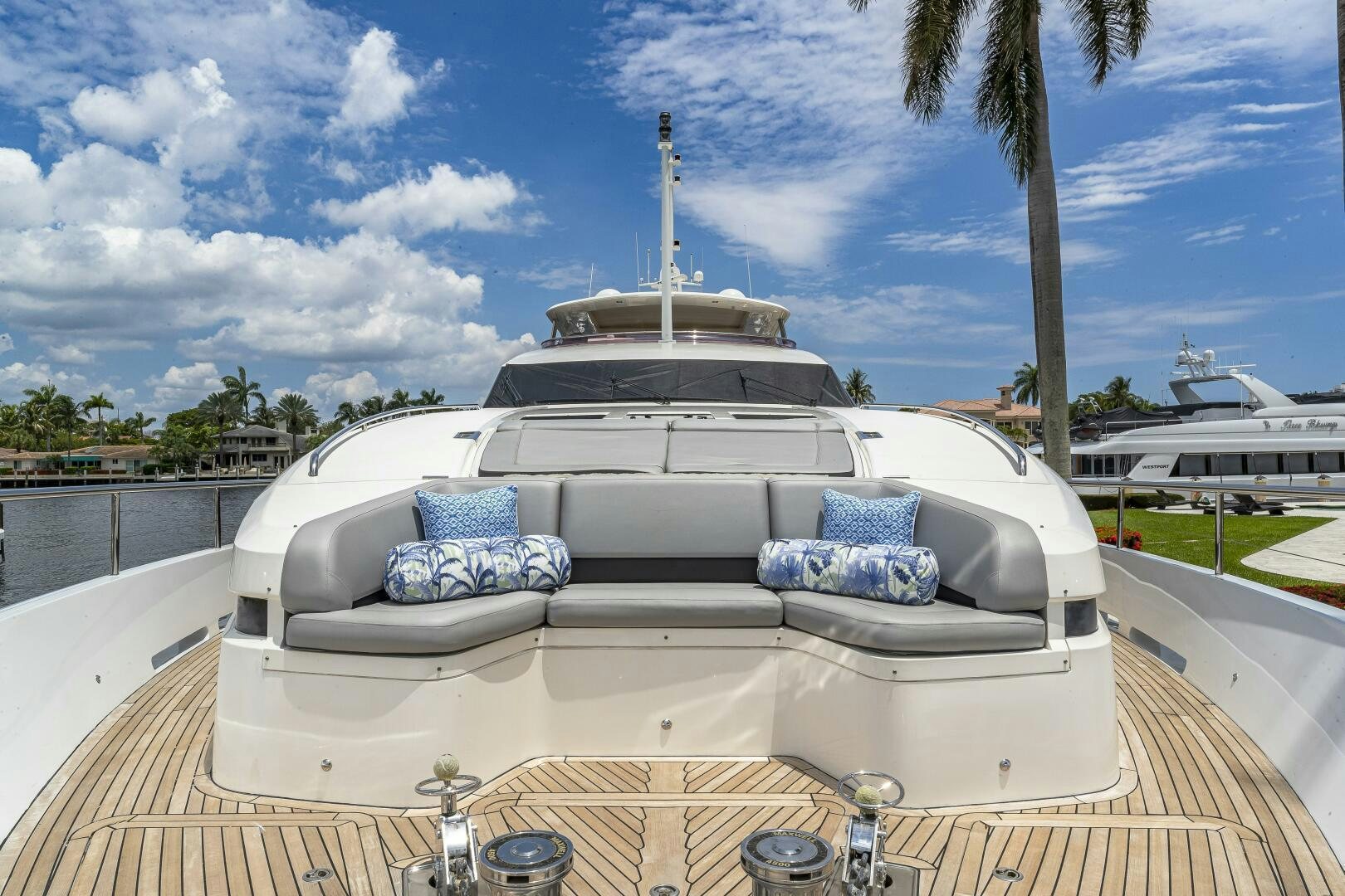 a white car with a blue roof aboard BEACHFRONT II Yacht for Sale