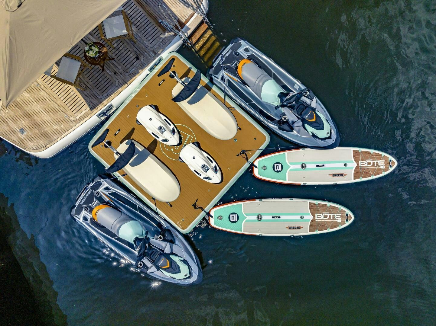 a group of kayaks on a body of water aboard BEACHFRONT II Yacht for Sale