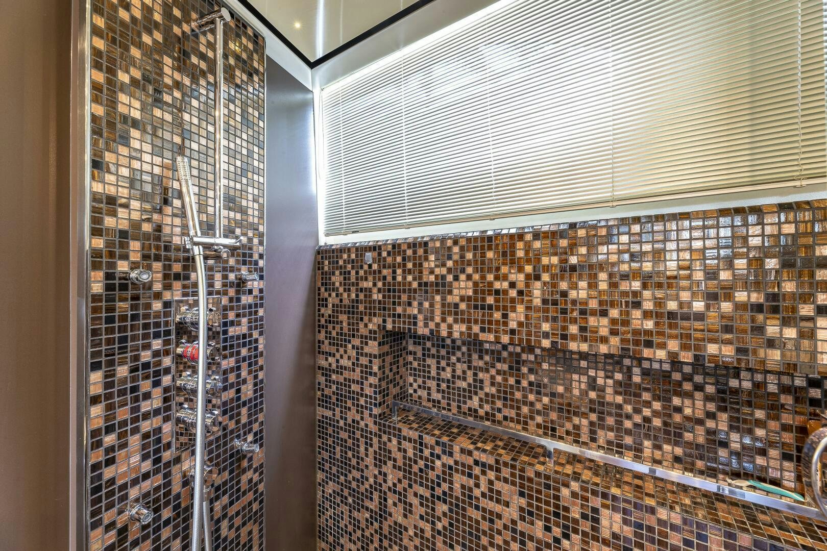 a view of a city from a window aboard BEACHFRONT II Yacht for Sale