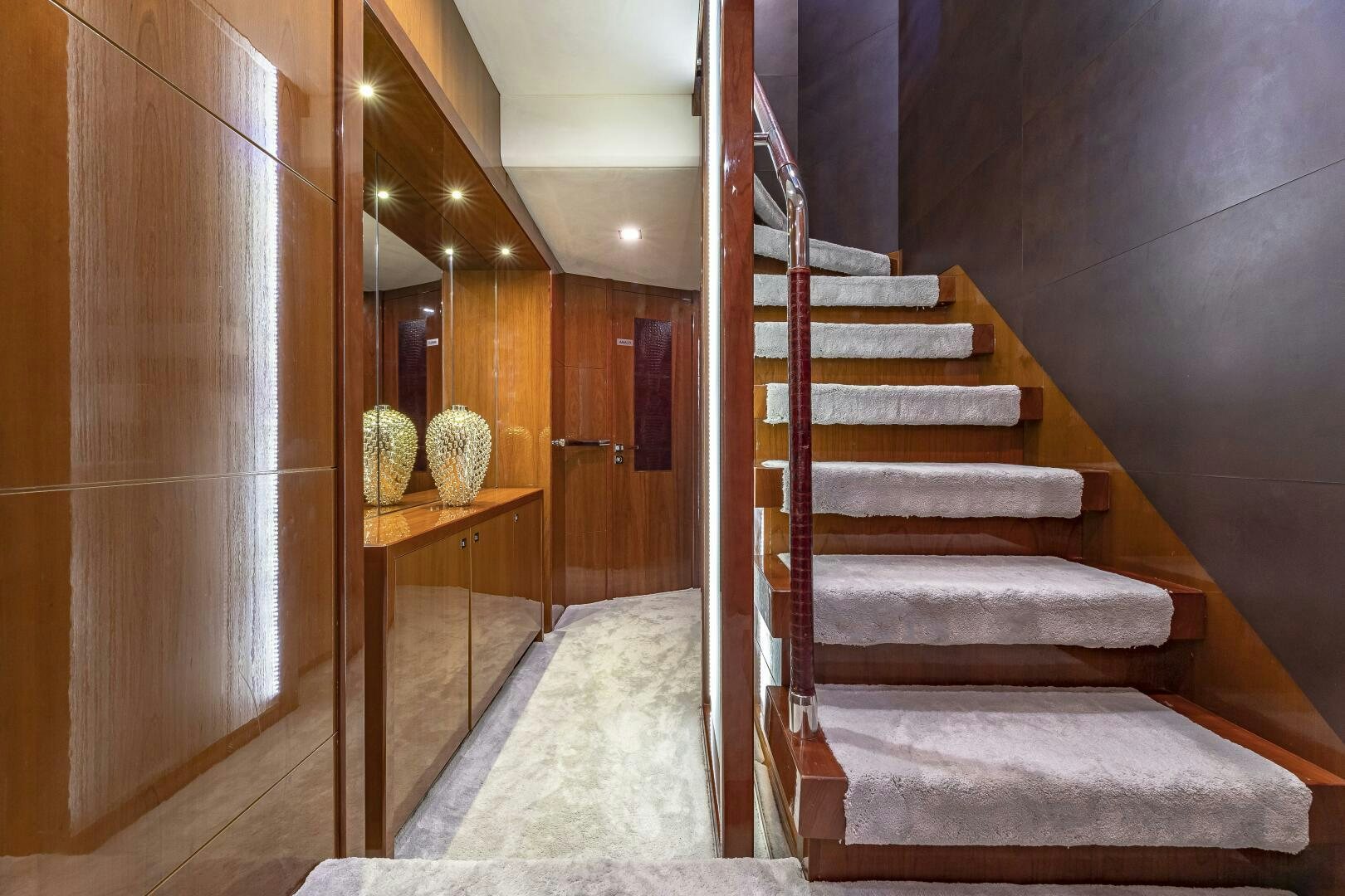 a staircase in a house aboard BEACHFRONT II Yacht for Sale