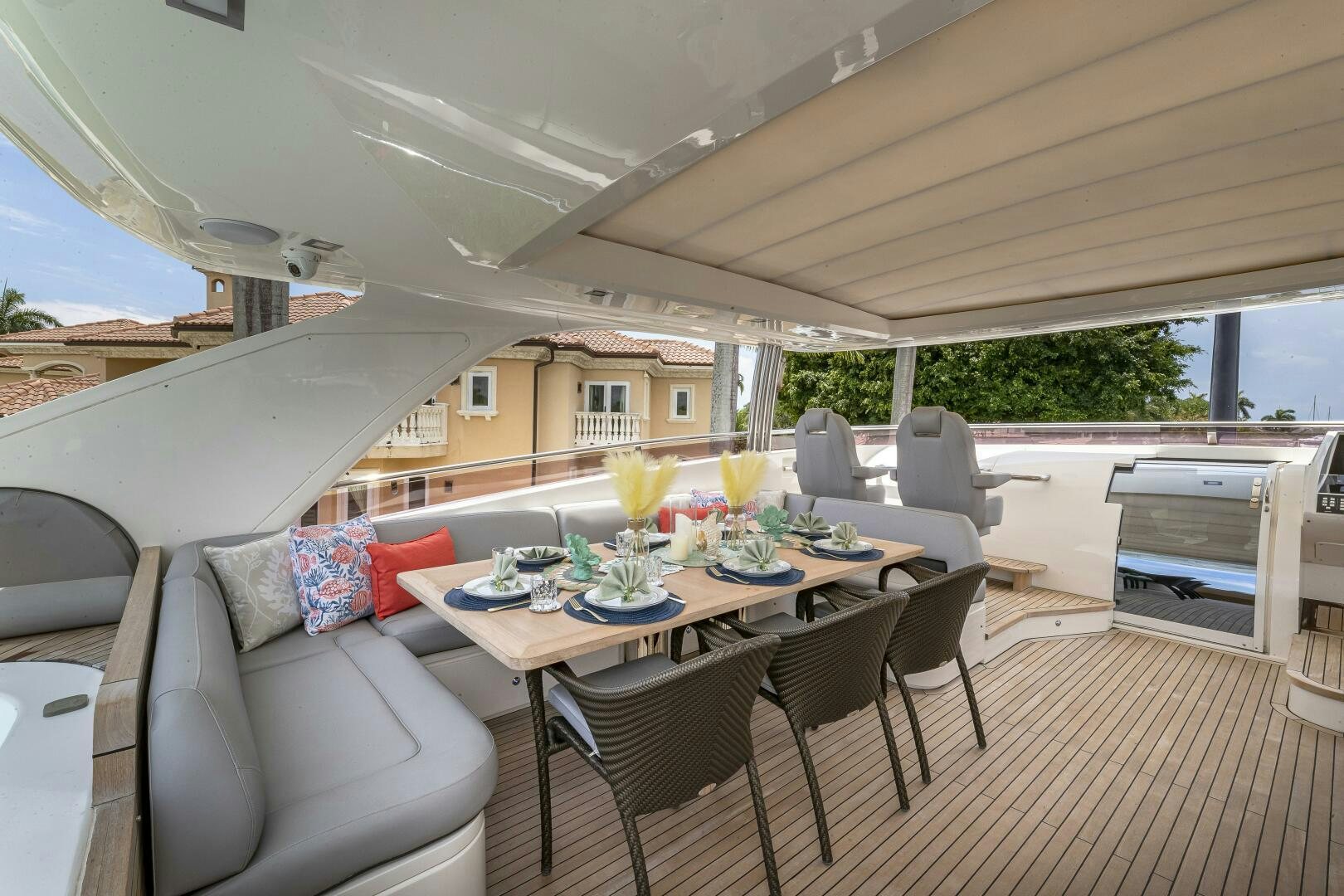 a tent with a table and chairs aboard BEACHFRONT II Yacht for Sale