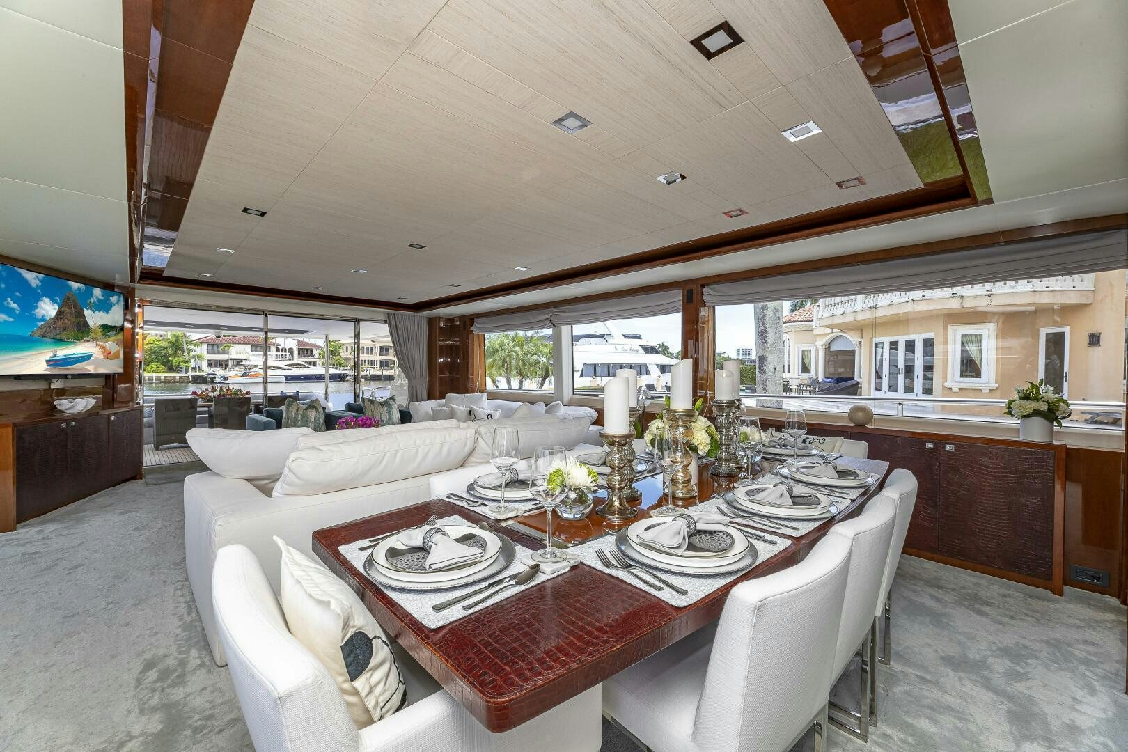 a dining table in a large room aboard BEACHFRONT II Yacht for Sale