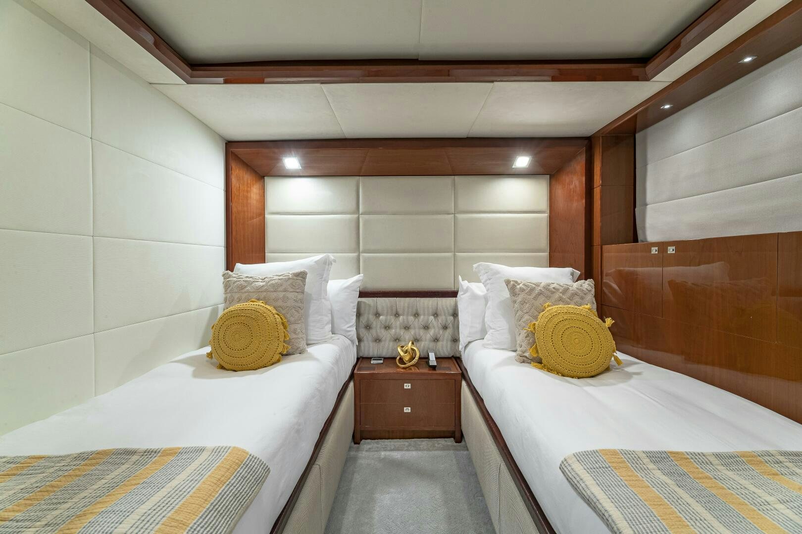 a room with two beds aboard BEACHFRONT II Yacht for Sale