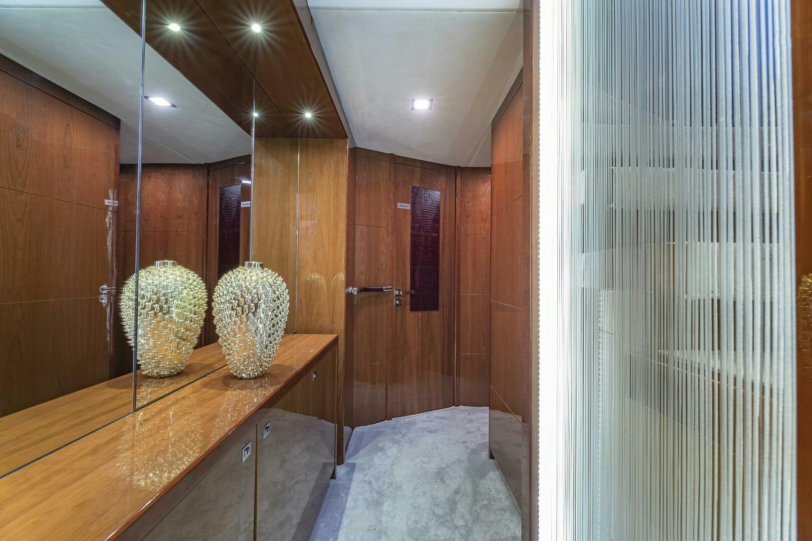 a bathroom with a large mirror aboard BEACHFRONT II Yacht for Sale