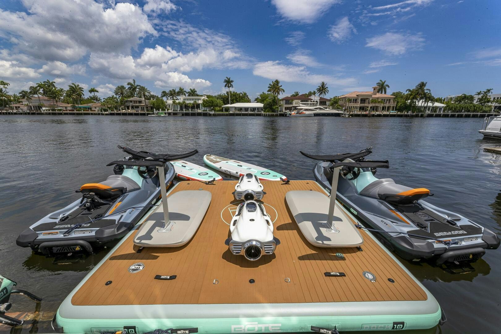 a row of boats on a dock aboard BEACHFRONT II Yacht for Sale