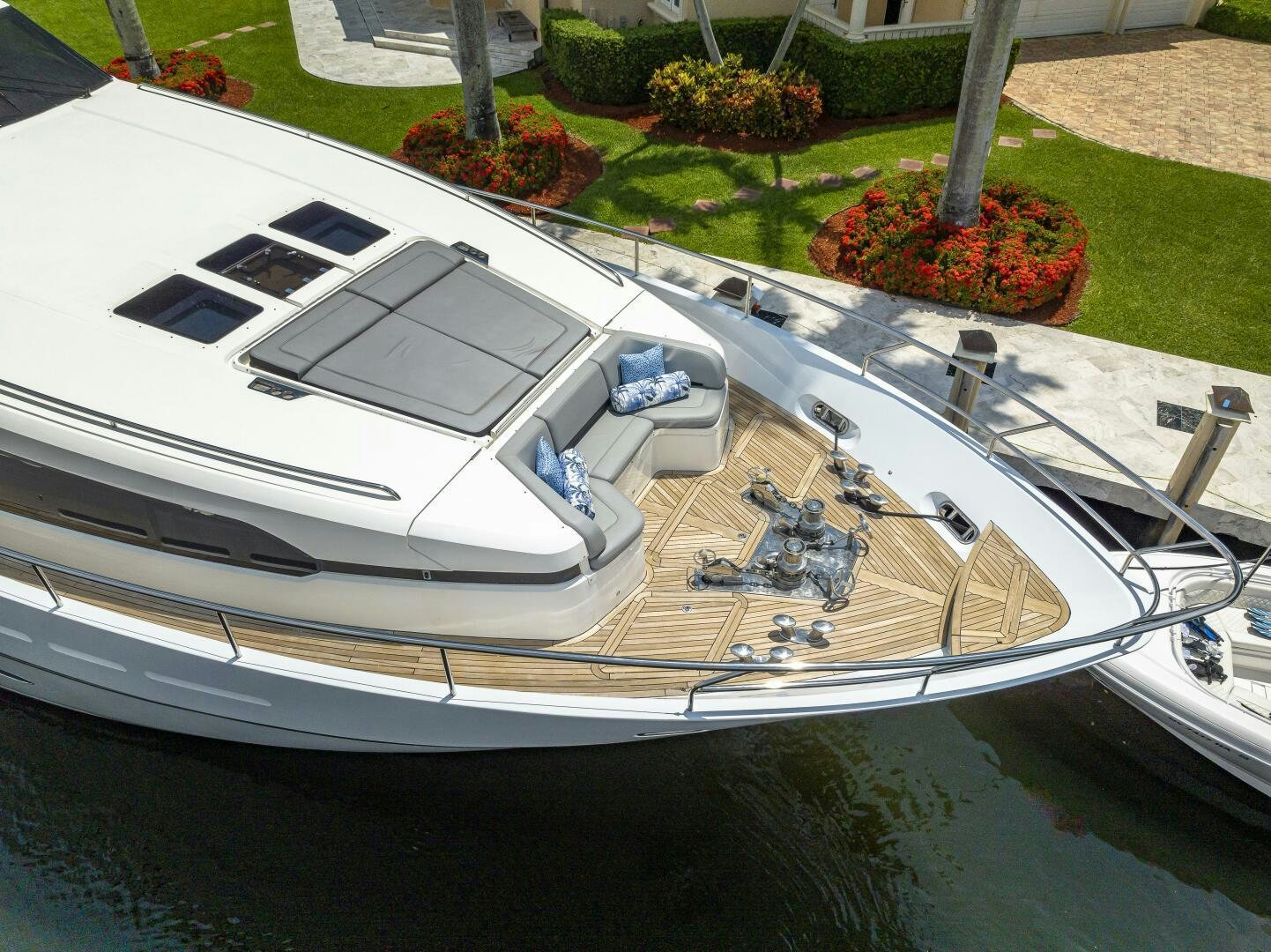 a white boat with a large window aboard BEACHFRONT II Yacht for Sale